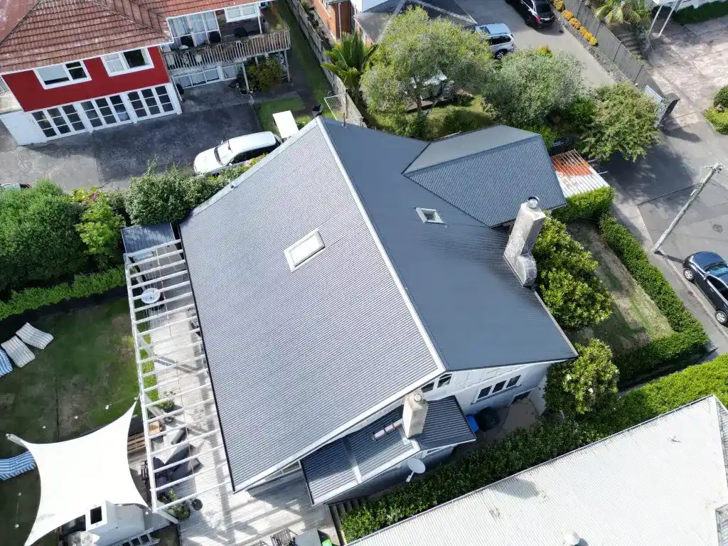 Roof repair specialist fixing damaged roof tiles