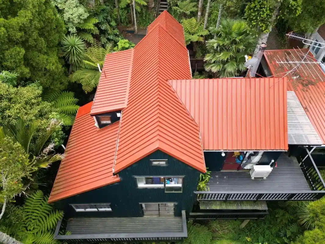 Before and after results of residential reroofing in Auckland